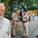Prime Minister Narendra Modi and Delhi Police Commissioner during a press briefing on social media monitoring linked to the NEET protest controversy.