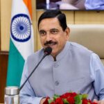 Pralhad Joshi addressing a meeting after taking charge as India's new Education Minister in New Delhi.