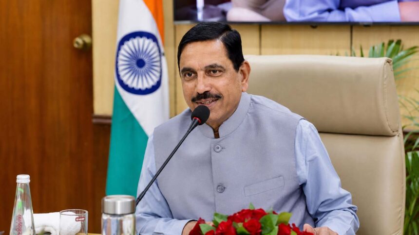 Pralhad Joshi addressing a meeting after taking charge as India's new Education Minister in New Delhi.